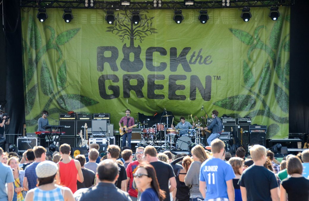 Band playing on stage at Rock the Green festival