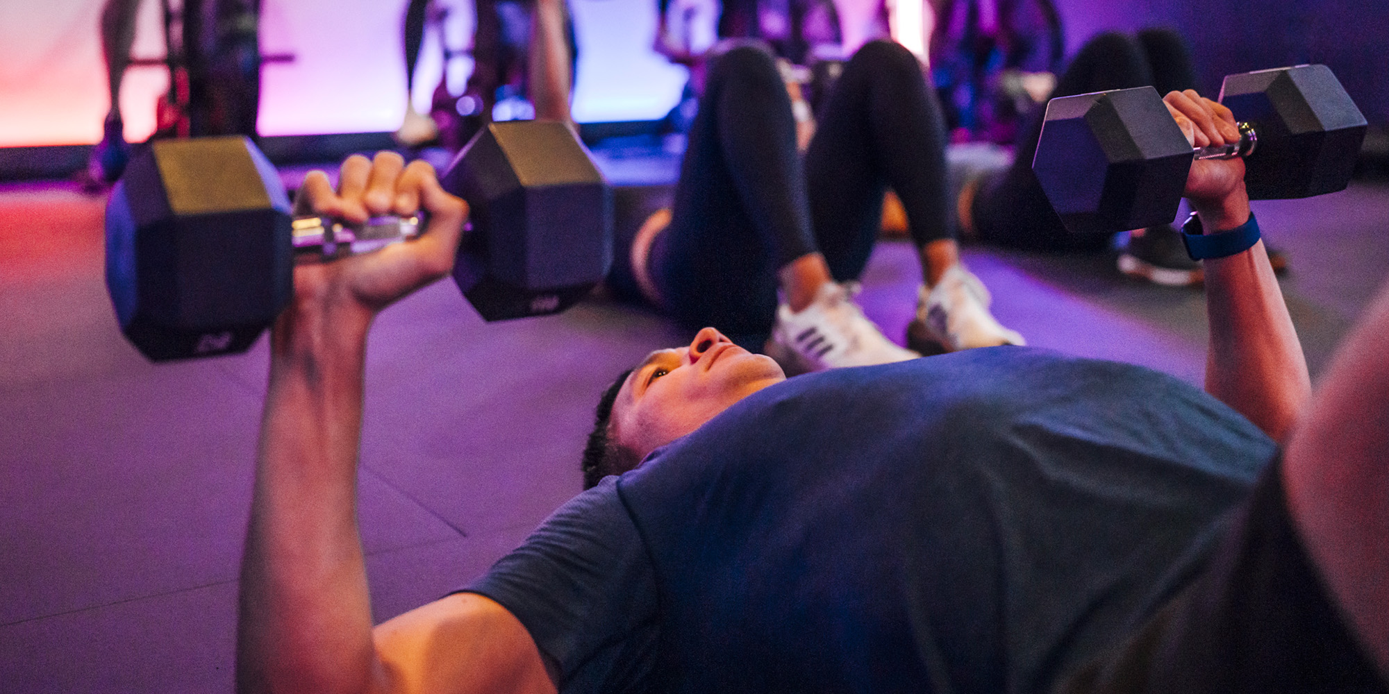 Man lifting dumbbells