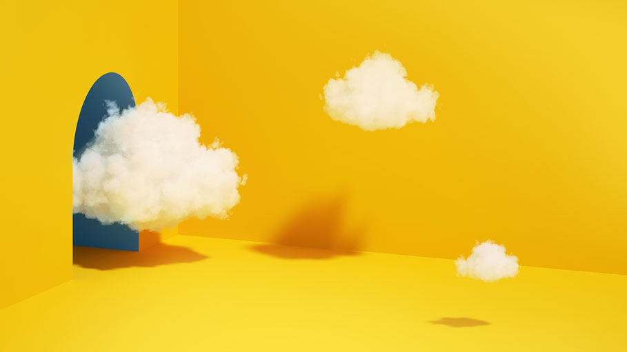 abstract minimal yellow background with white clouds flying out the tunnel