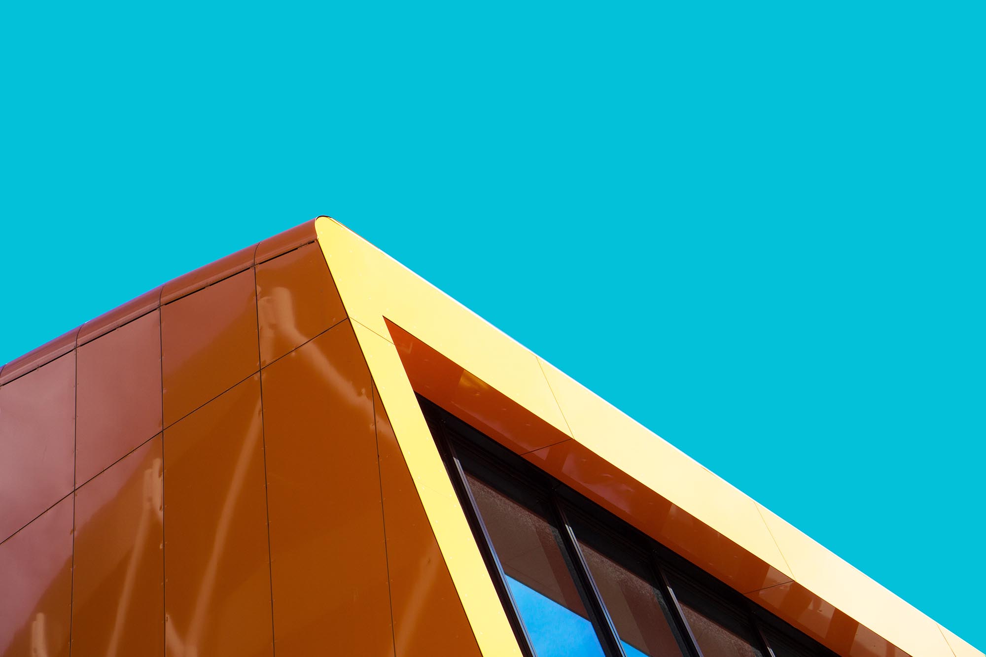 Orange decorative facade panels for exterior cladding. Abstract architecture photography
