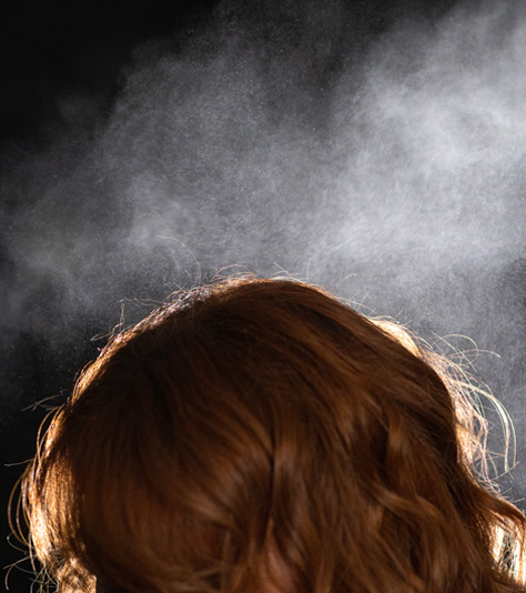 Mist falling on woman's hair