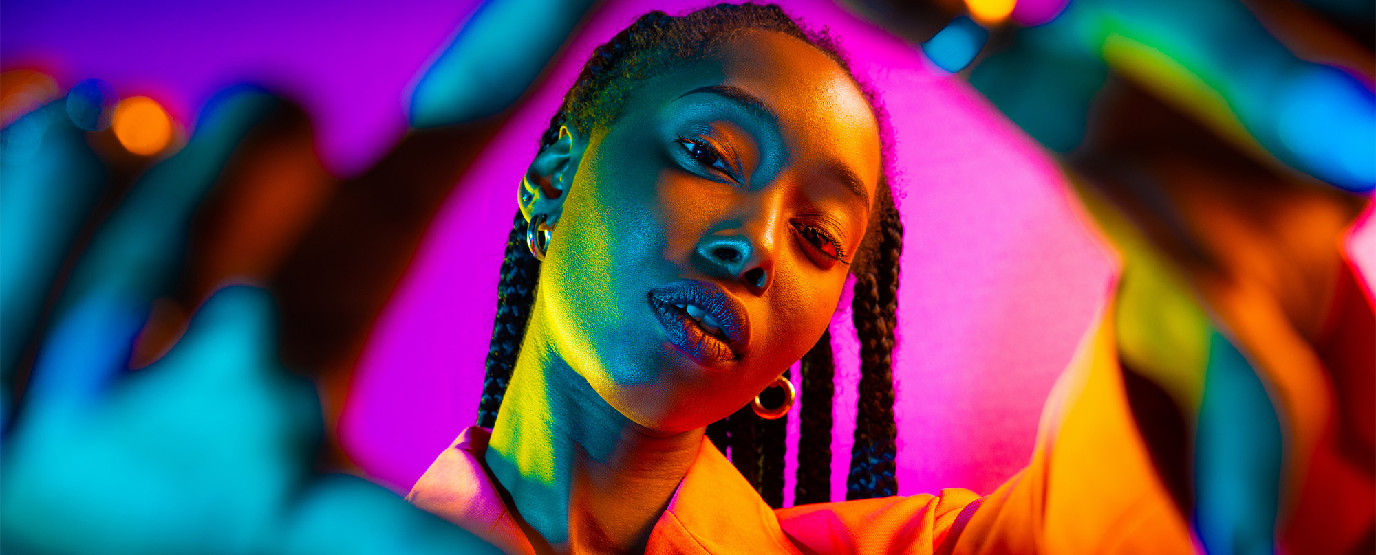 Portrait of young african american woman in studio, creative portrait with fashionable style in studio.