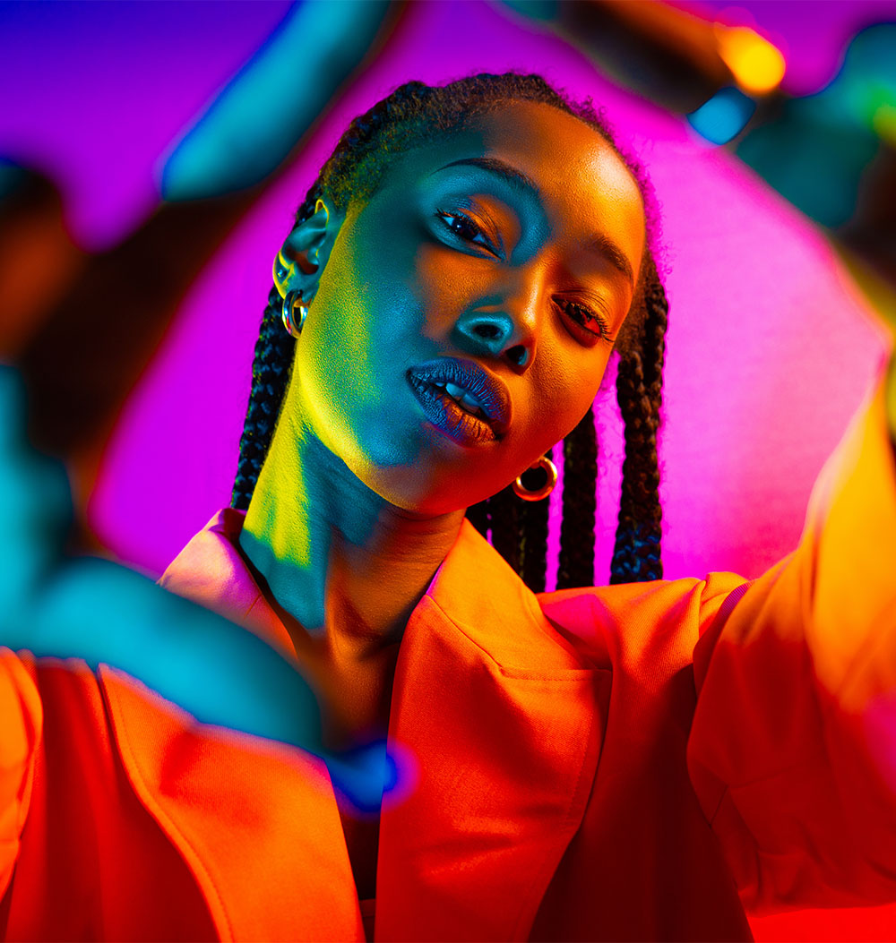 Portrait of young african american woman in studio, creative portrait with fashionable style in studio.