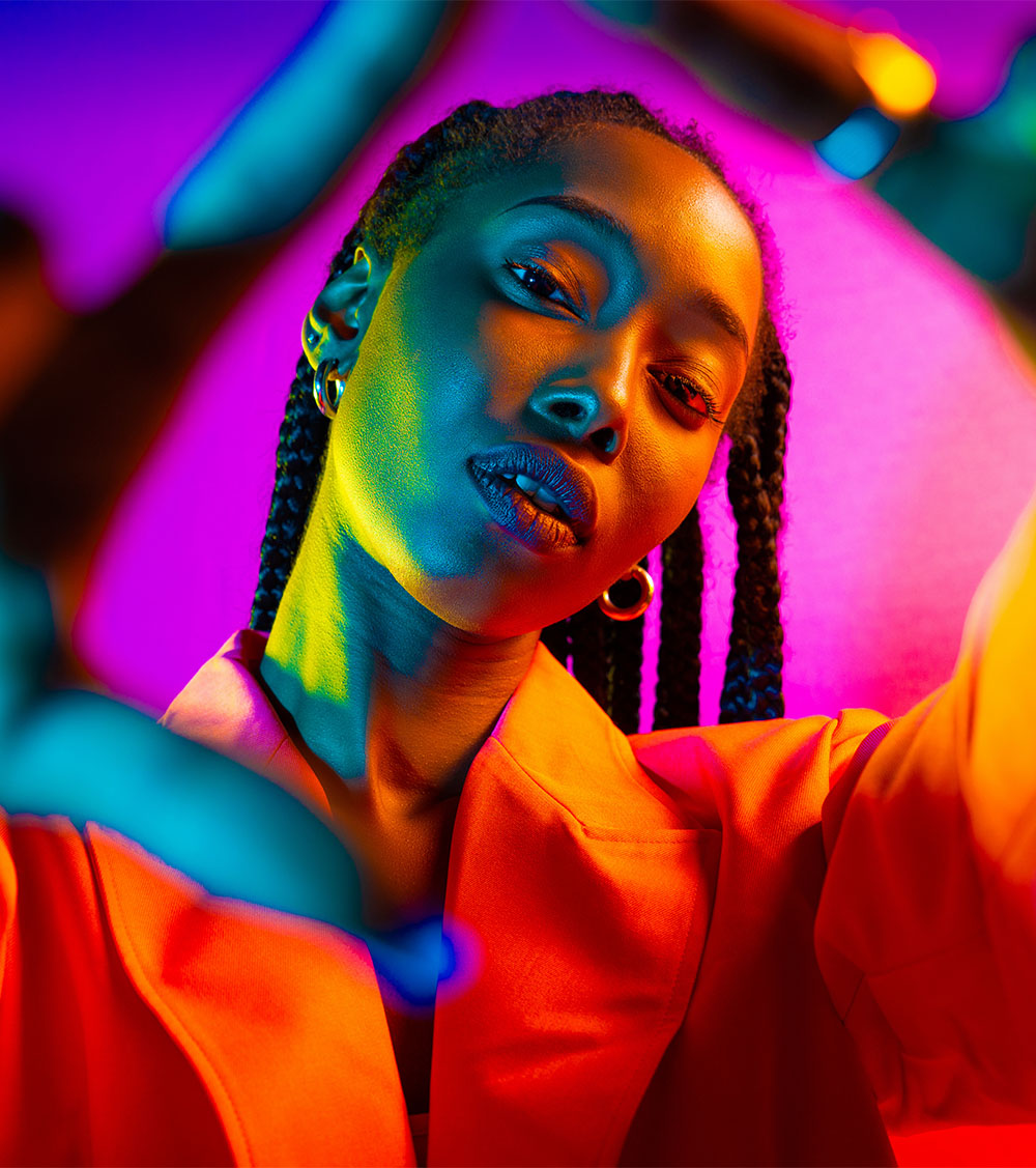 Portrait of young african american woman in studio, creative portrait with fashionable style in studio.