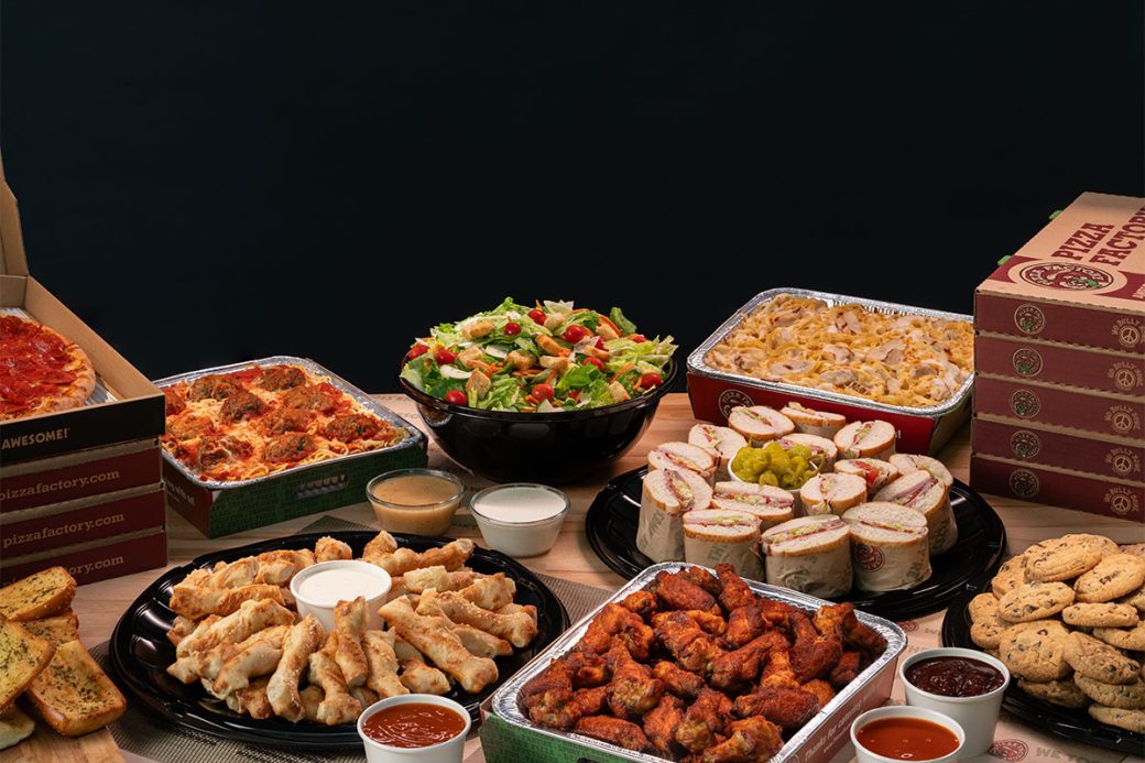 An example promotional photo that shows off Pizza Factory's catering food items.