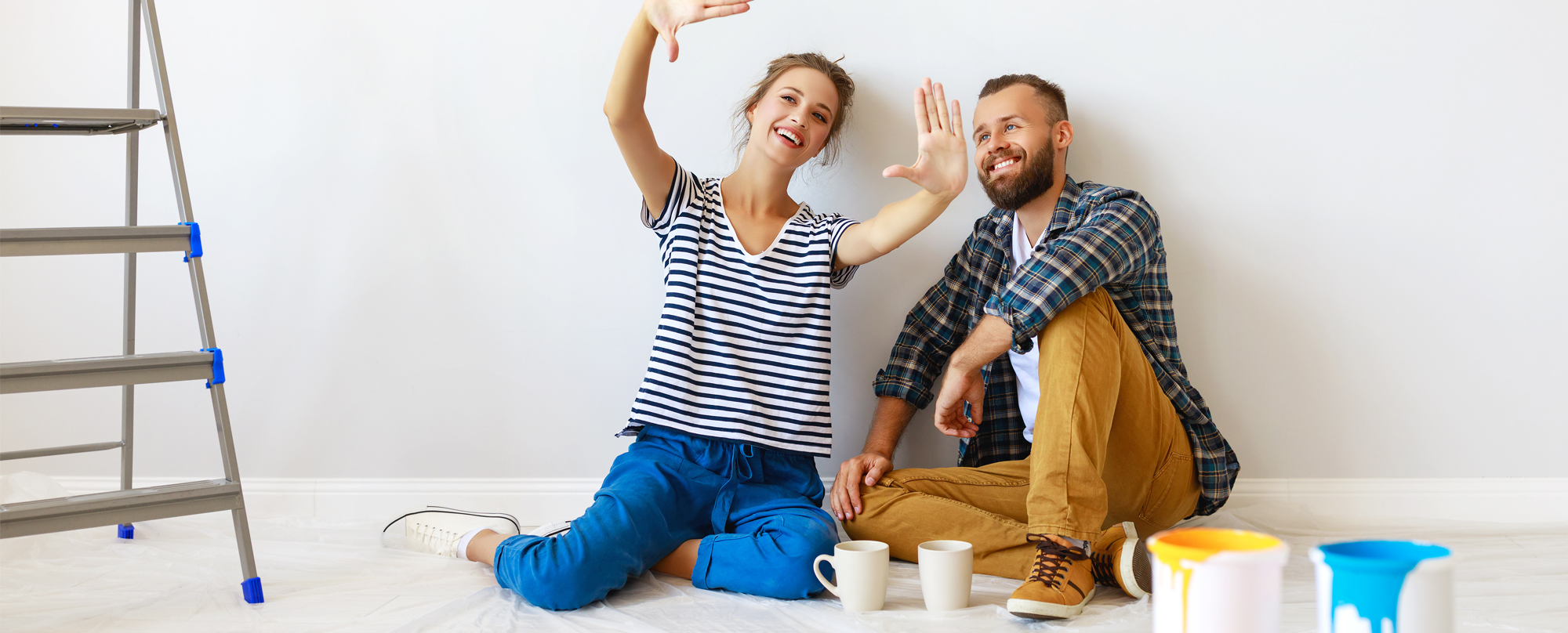 Husband and wife envisioning their painting
