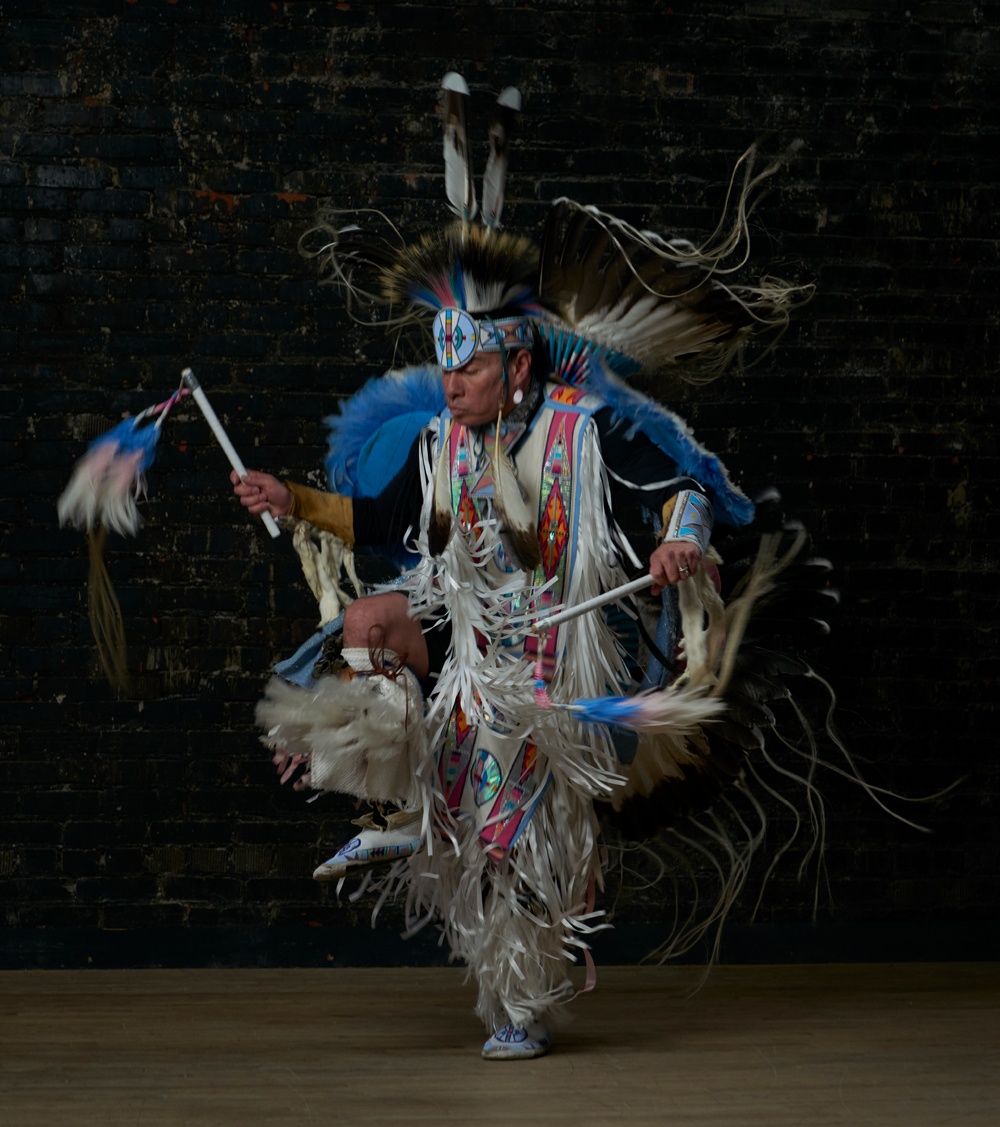 dancer in traditional native American clothing
