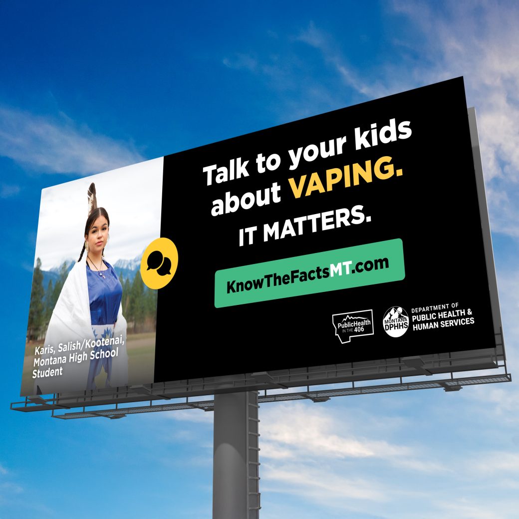 public health message on billboard promoting dialogue about vaping, with sunny sky in the background