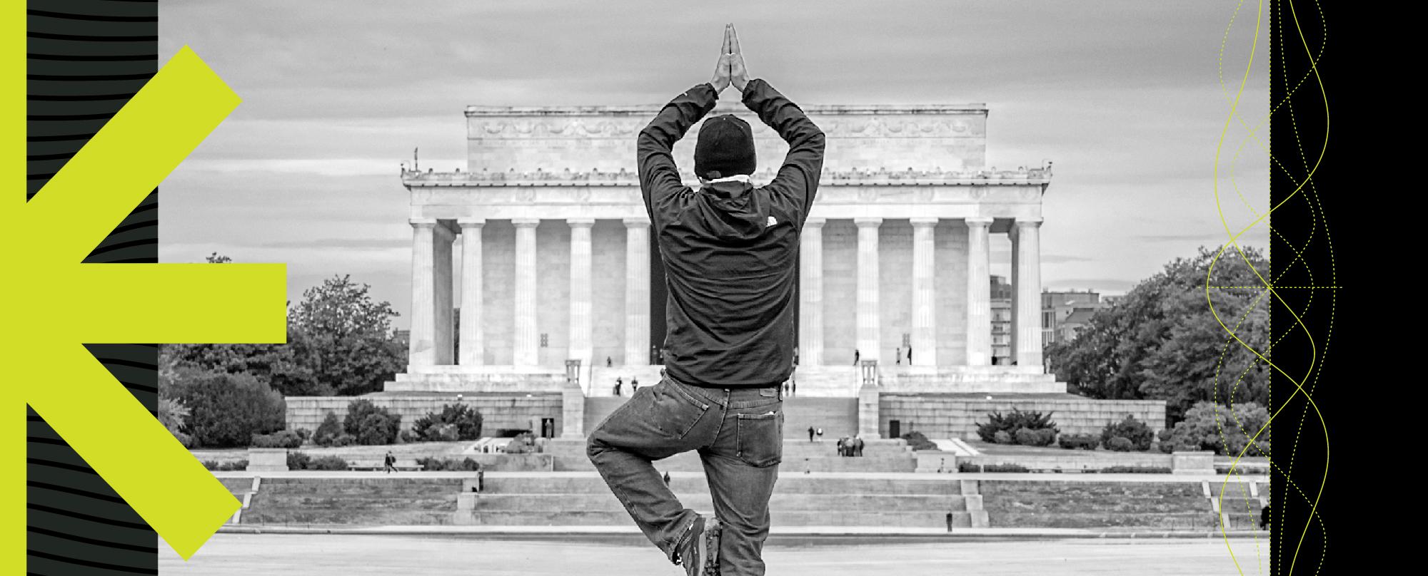 A man is doing yoga in front of the Lincoln Memorial.